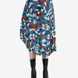 Blue skirts worn by a person, showing the skirt's fit