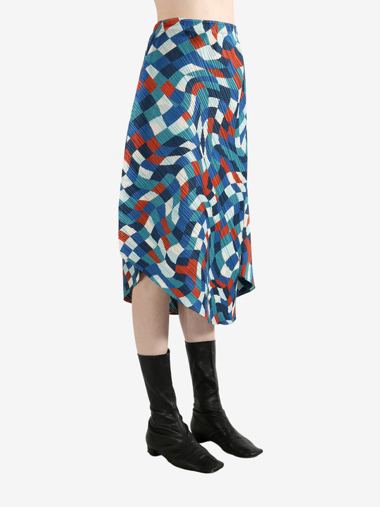 Blue skirts worn by a person, showing the skirt's fit