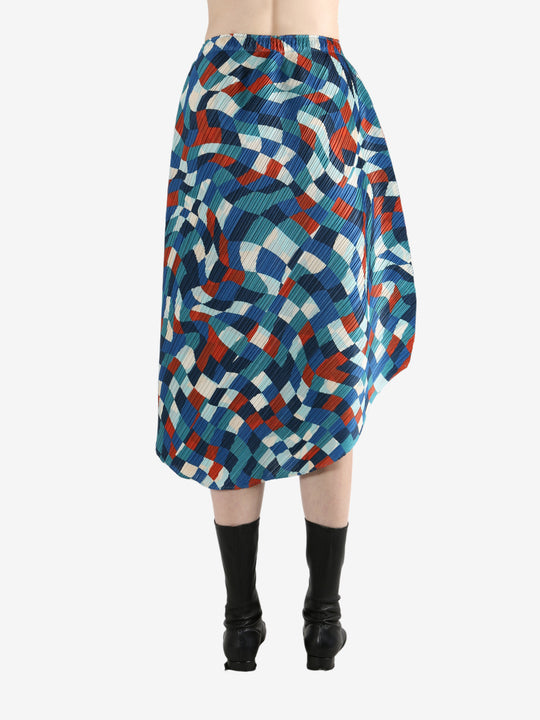 Blue skirts worn by a person, showing the skirt's fit