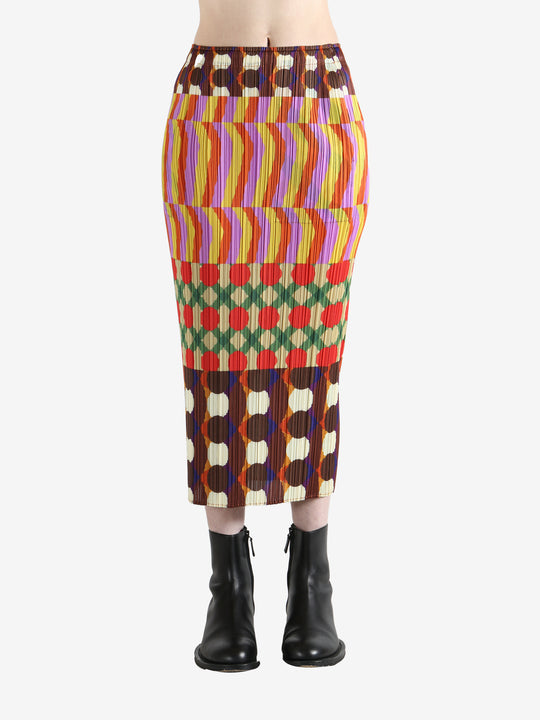 Colorful patterned skirt worn by a person, showing the skirt fit