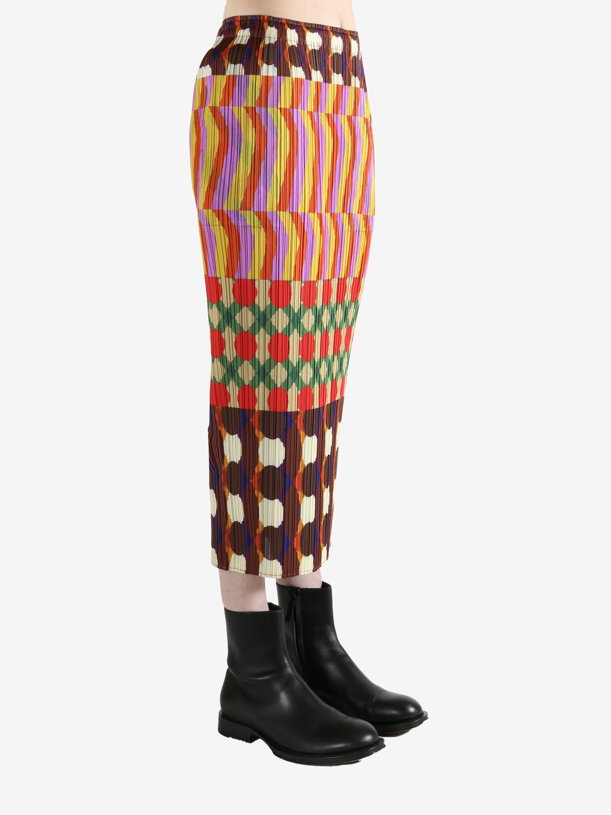 Colorful patterned skirt worn by a person, showing the skirt fit