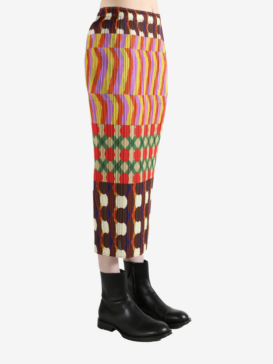 Colorful patterned skirt worn by a person, showing the skirt fit