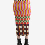 Colorful patterned skirt worn by a person, showing the skirt fit