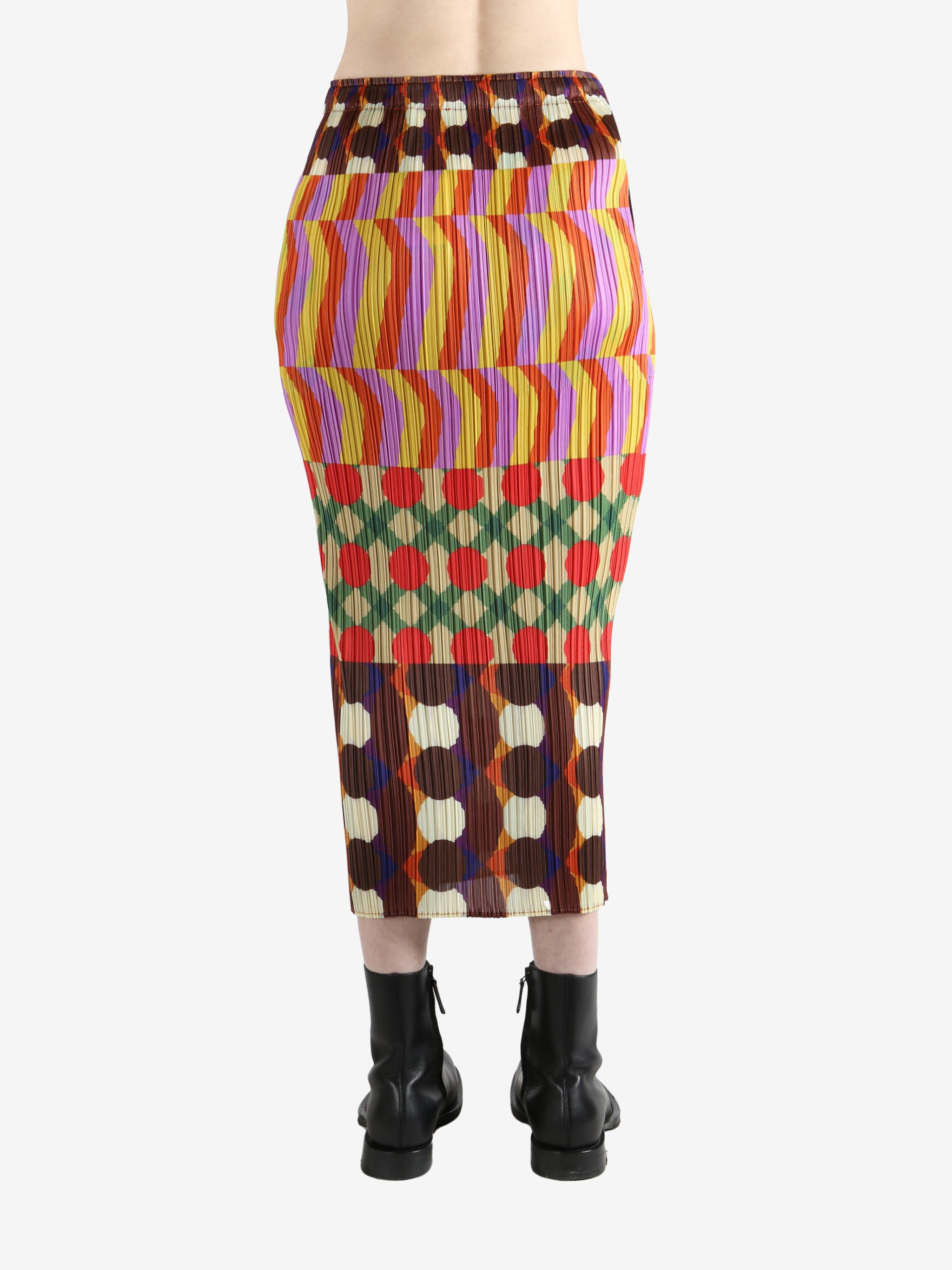 Colorful patterned skirt worn by a person, showing the skirt fit