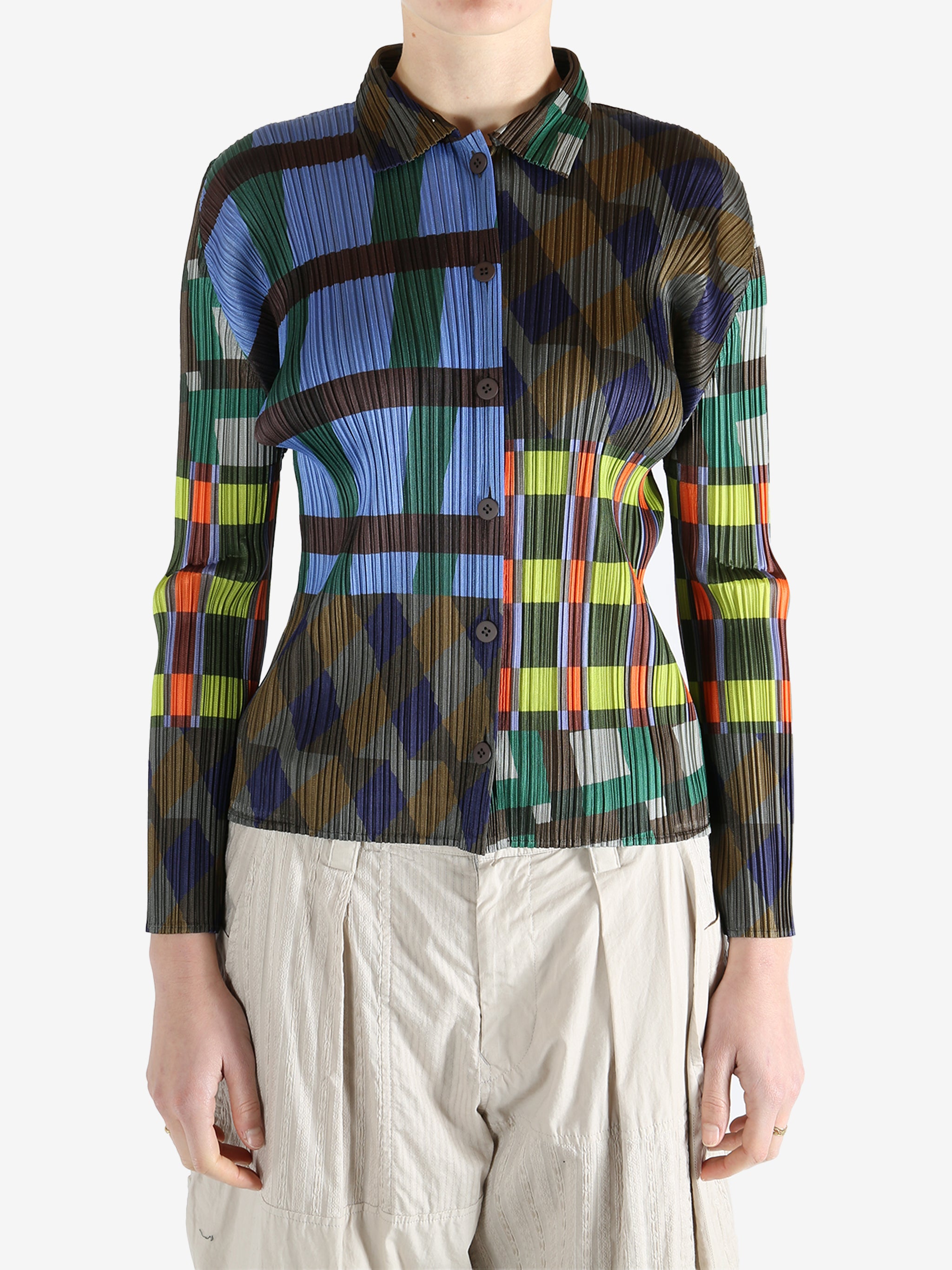 Blue shirt worn by a person, showing the shirt's fit