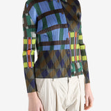 Blue shirt worn by a person, showing the shirt's fit