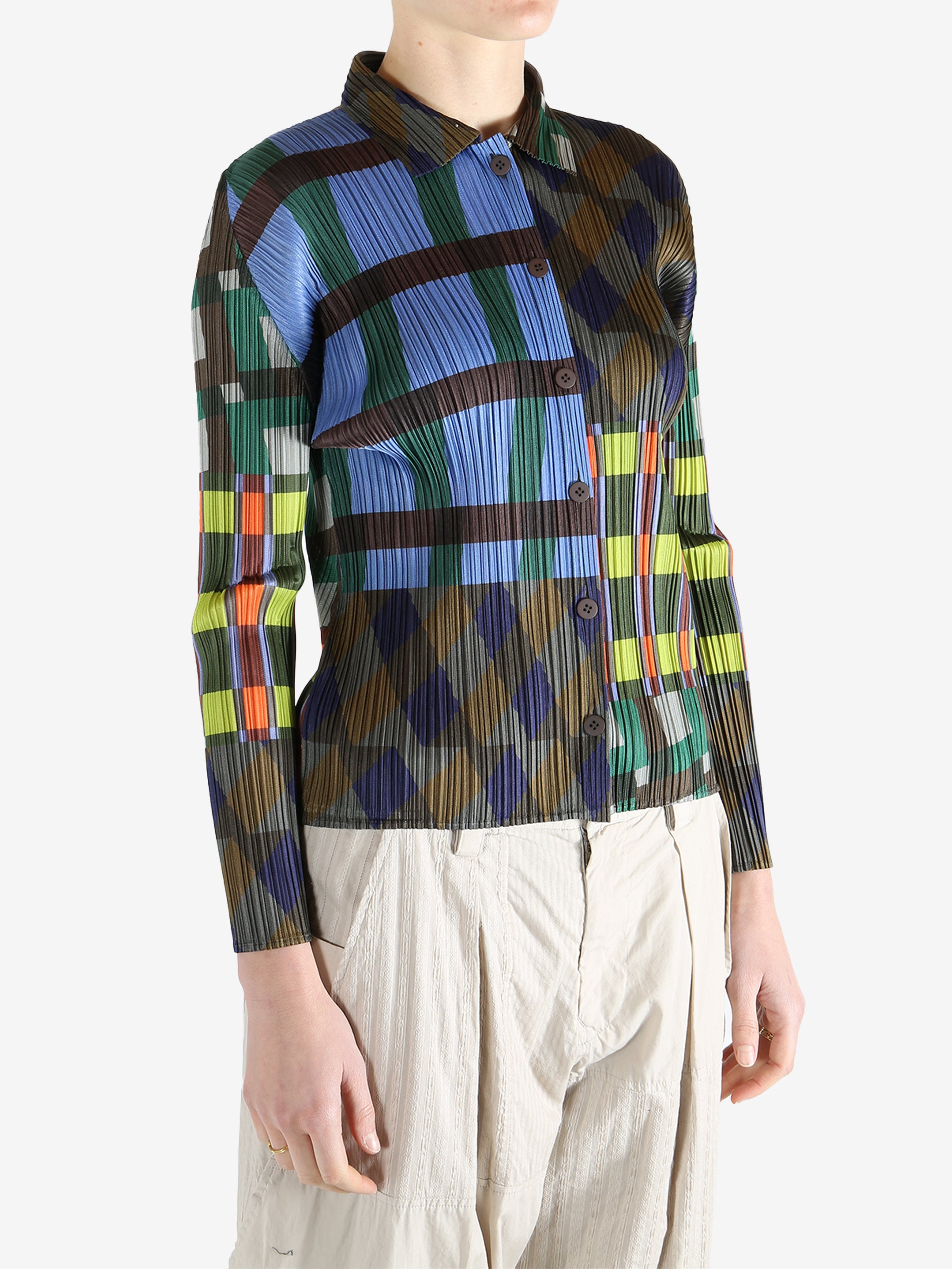 Blue shirt worn by a person, showing the shirt's fit