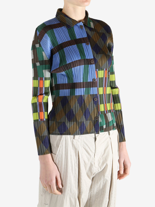 Blue shirt worn by a person, showing the shirt's fit