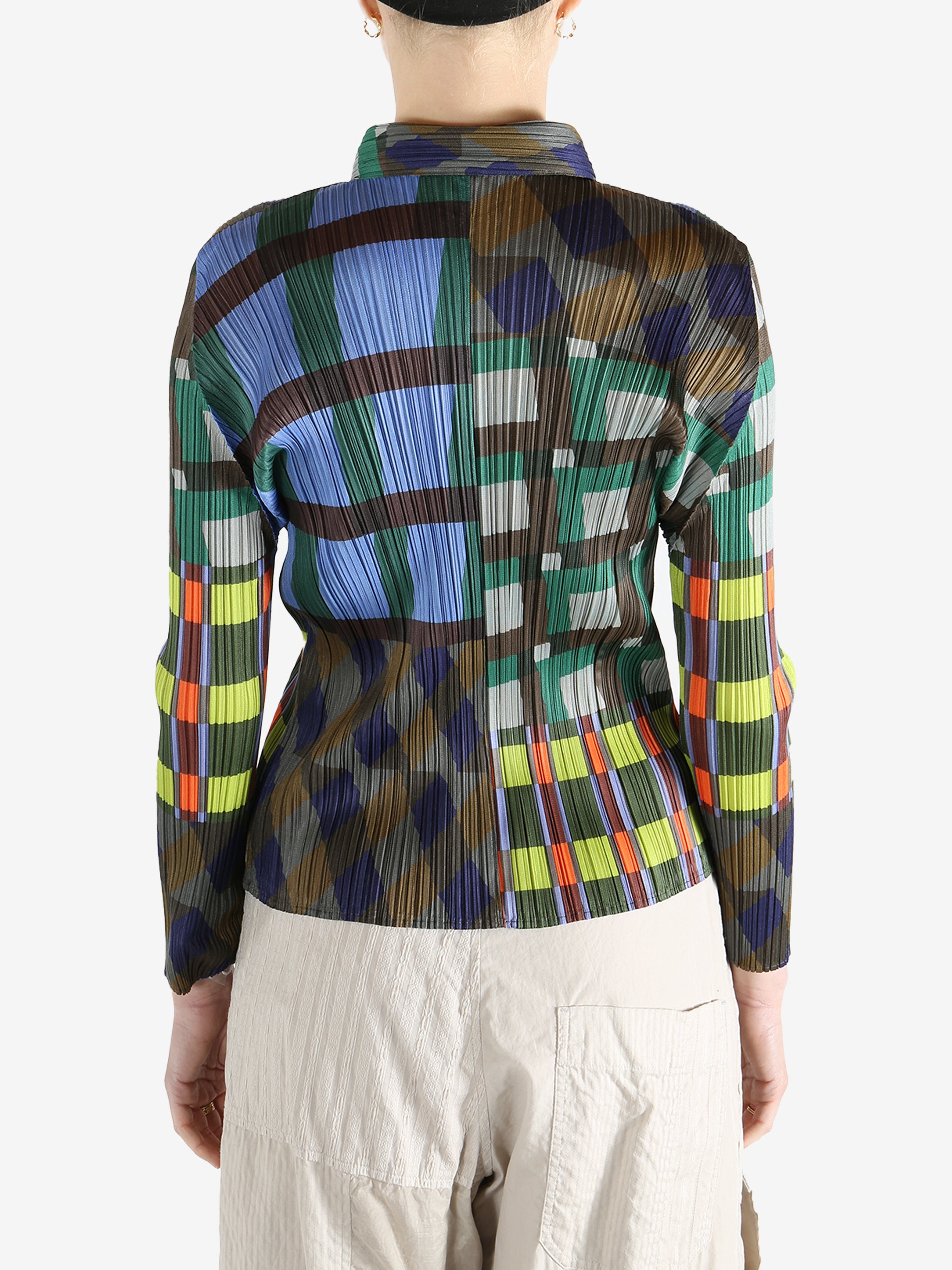 Blue shirt worn by a person, showing the shirt's fit