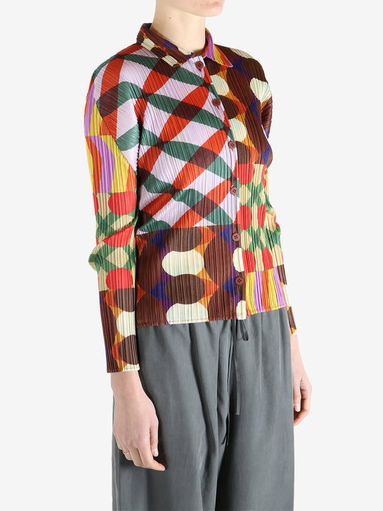 Pink shirt worn by a person, showing the shirt fit