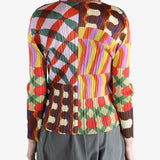 Pink shirt worn by a person, showing the shirt fit