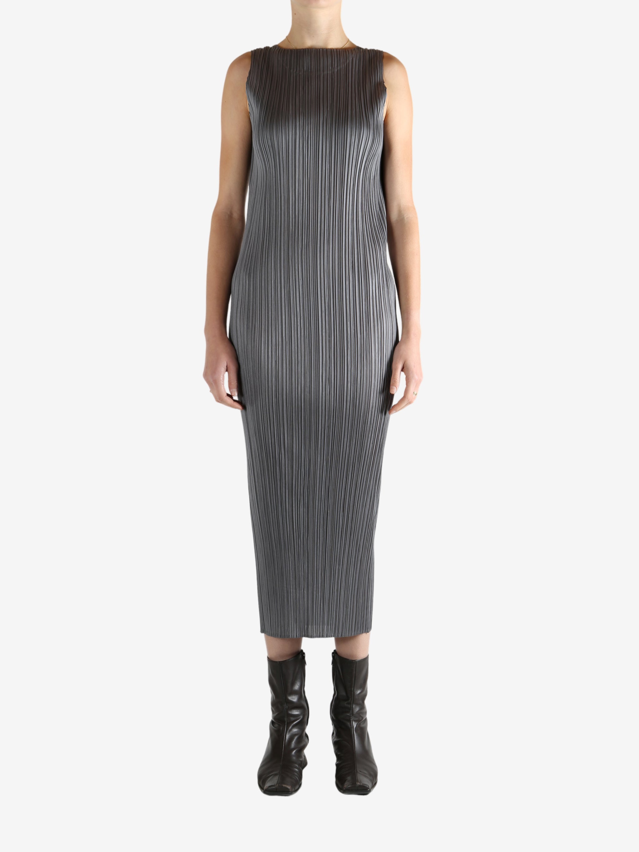 Grey dress worn by a person, showing the dress's fit