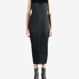 Grey dress worn by a person, showing the dress's fit