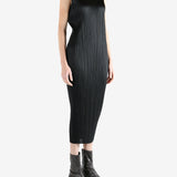 Grey dress worn by a person, showing the dress's fit