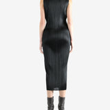 Grey dress worn by a person, showing the dress's fit