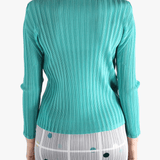 Blue shirt worn by a person, showing the shirt's fit