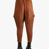 Brown pants worn by a person, showing the pants's fit