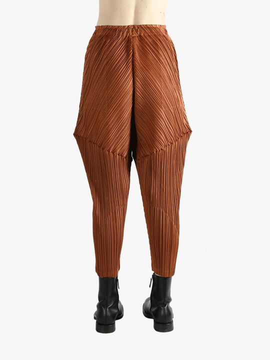 Brown pants worn by a person, showing the pants's fit