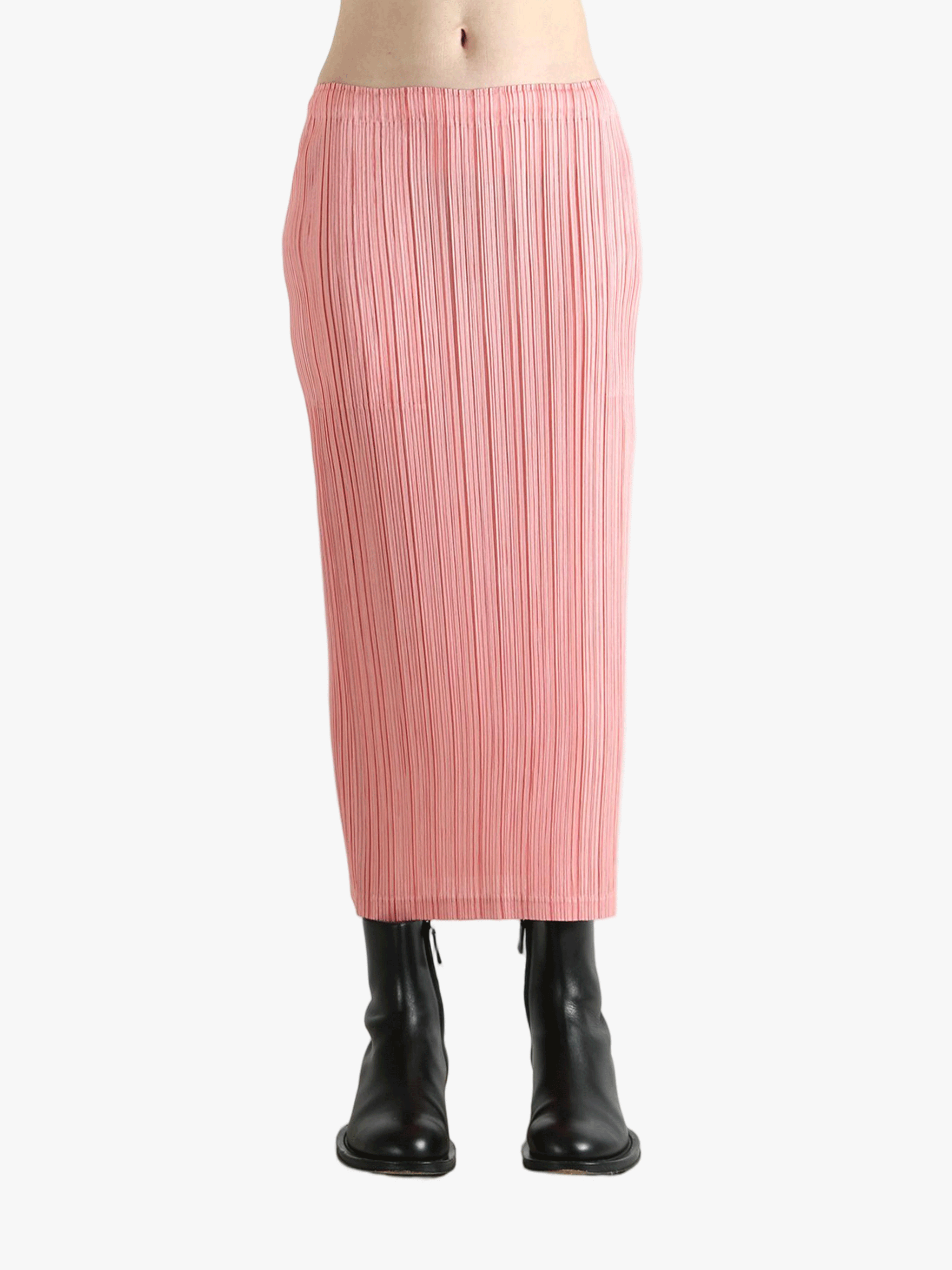 Pink skirt worn by a person, showing the  skirt's fit