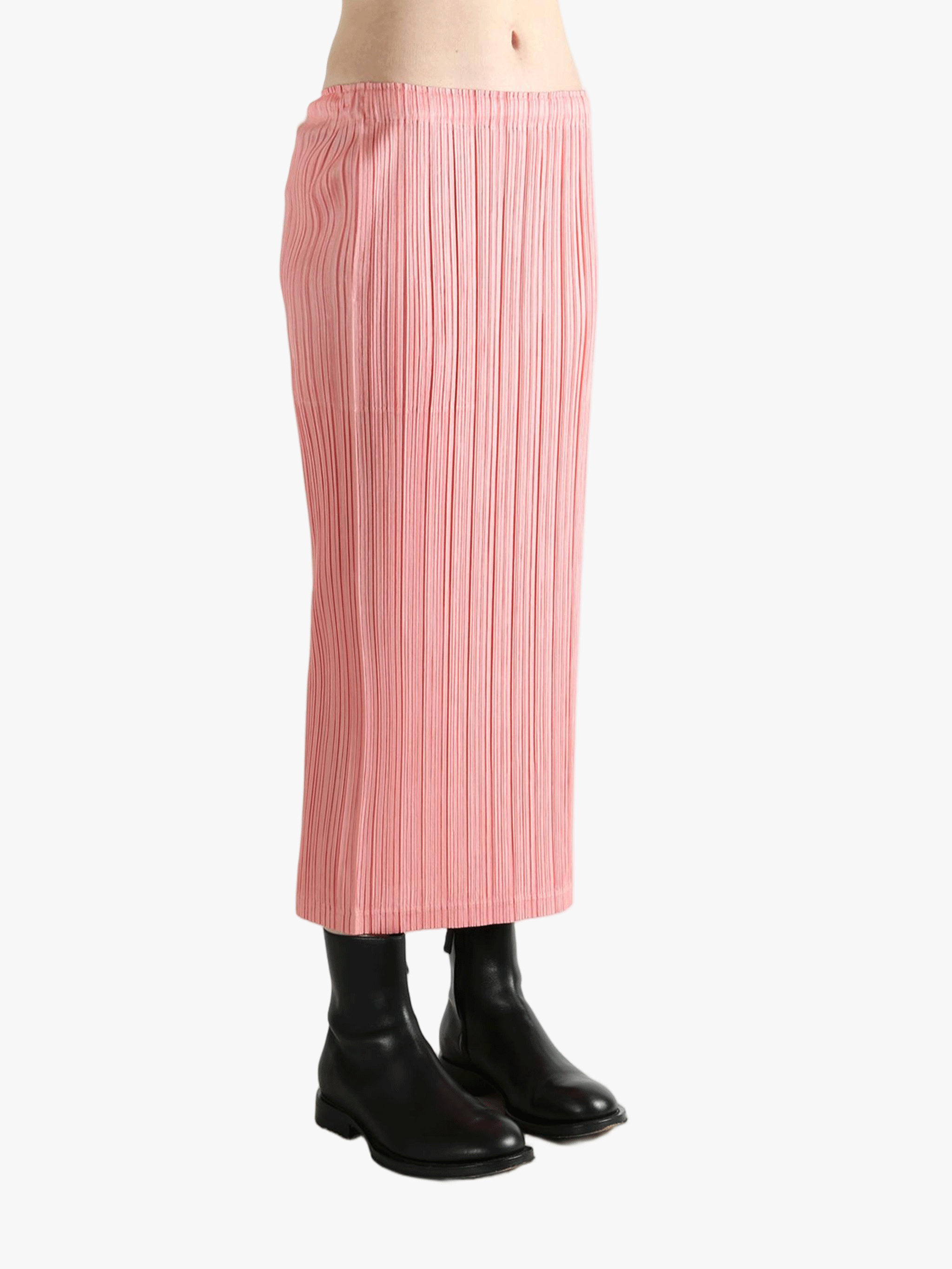 Pink skirt worn by a person, showing the  skirt's fit
