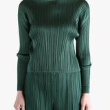 Green shirt worn by a person, showing the shirt's fit