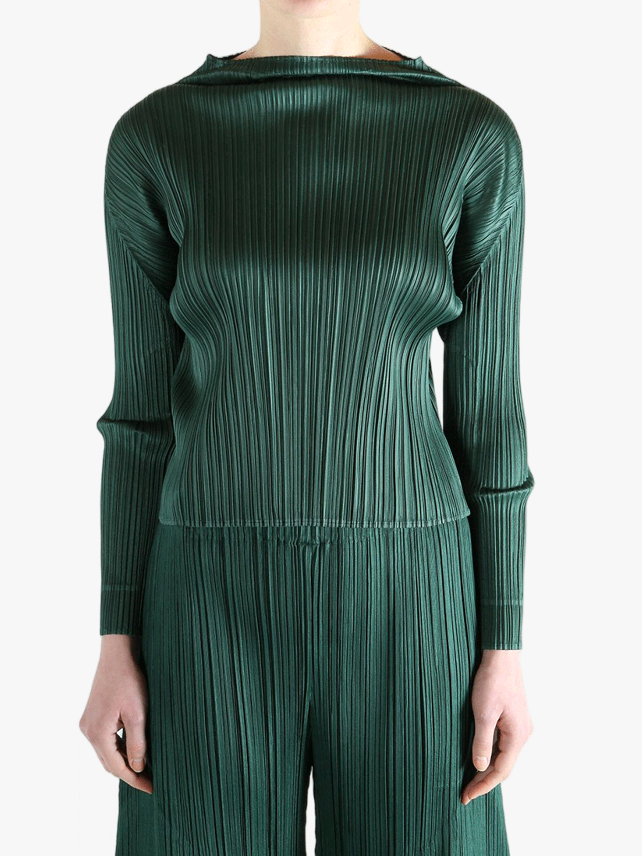 Green shirt worn by a person, showing the shirt's fit