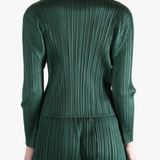 Green shirt worn by a person, showing the shirt's fit