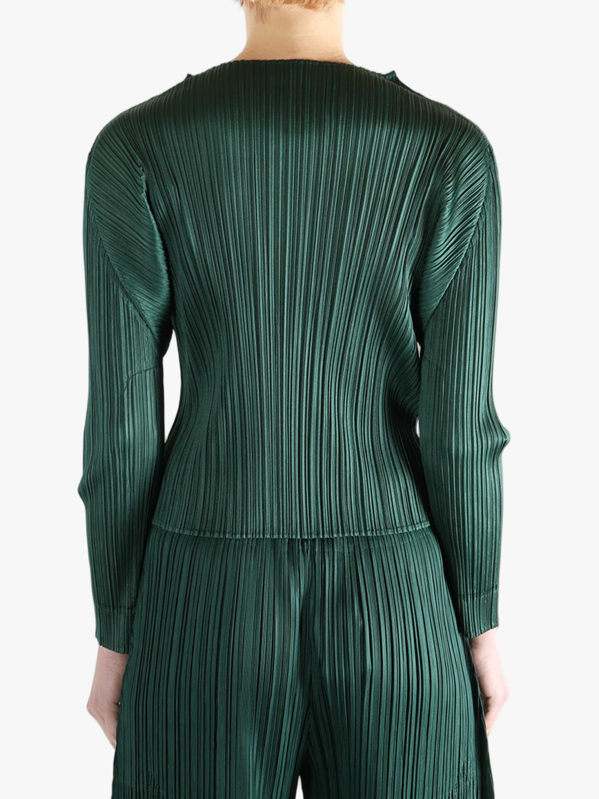 Green shirt worn by a person, showing the shirt's fit