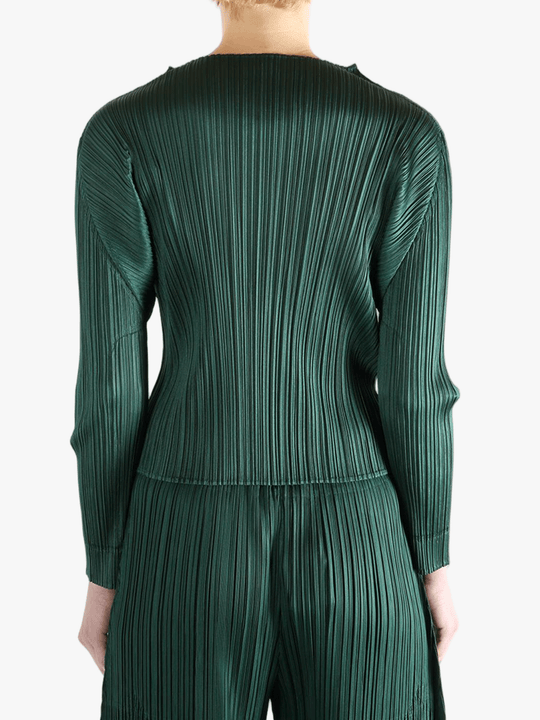 Green shirt worn by a person, showing the shirt's fit