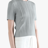 Grey shirt worn by a person, back view