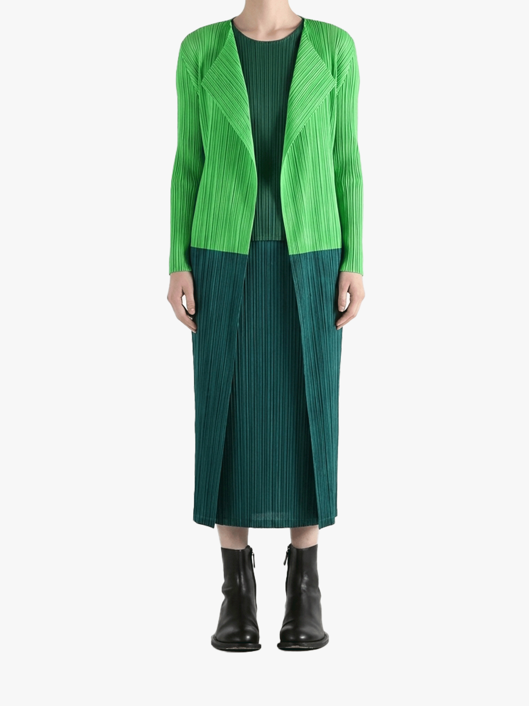 Green knitwear worn by a person, showing the knitwear fit