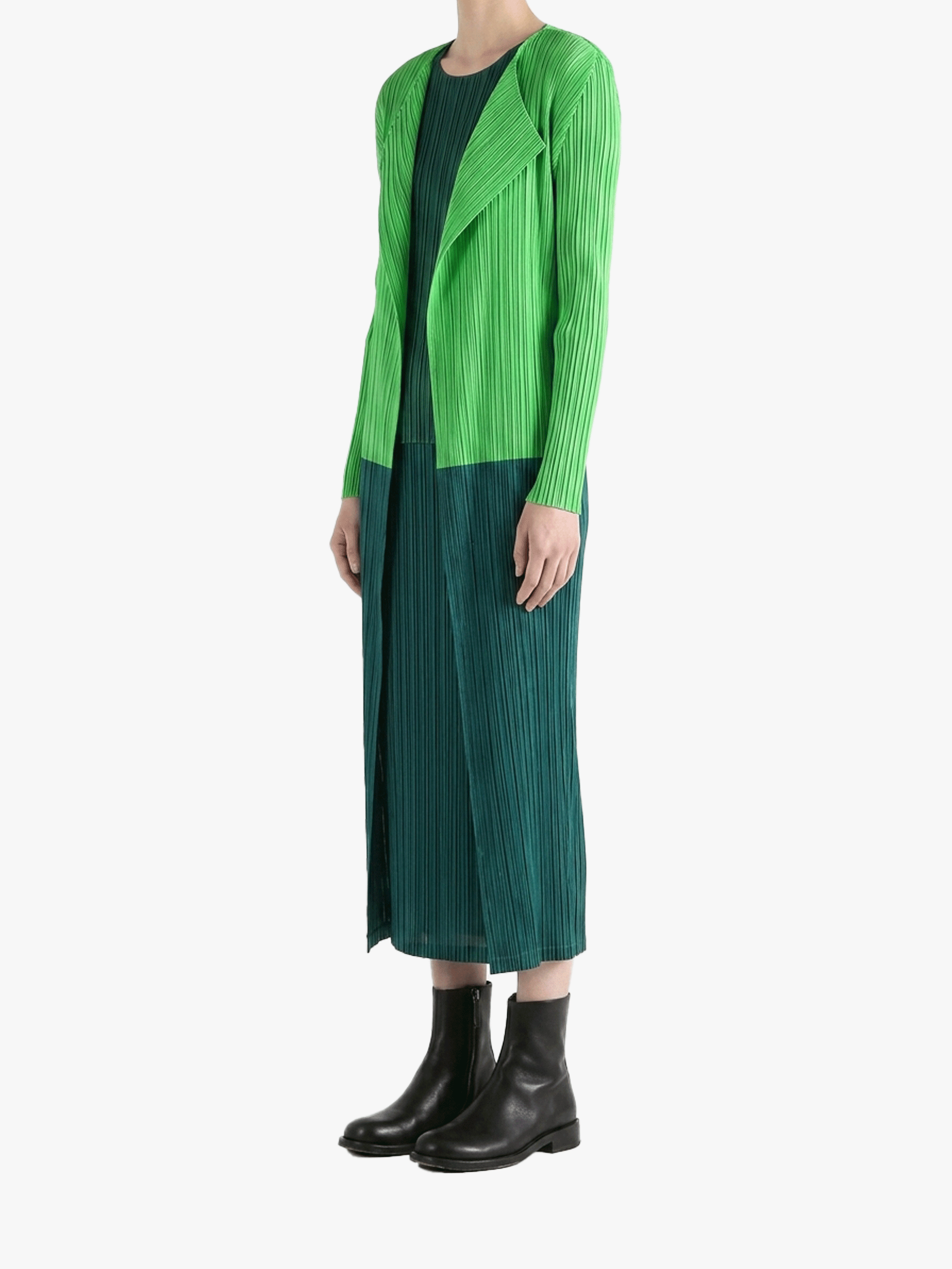 Green knitwear worn by a person, side view