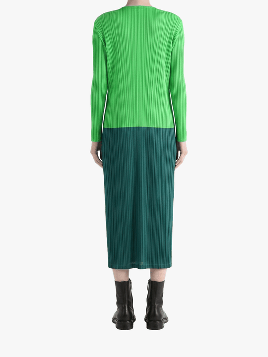 Green knitwear worn by a person, back view