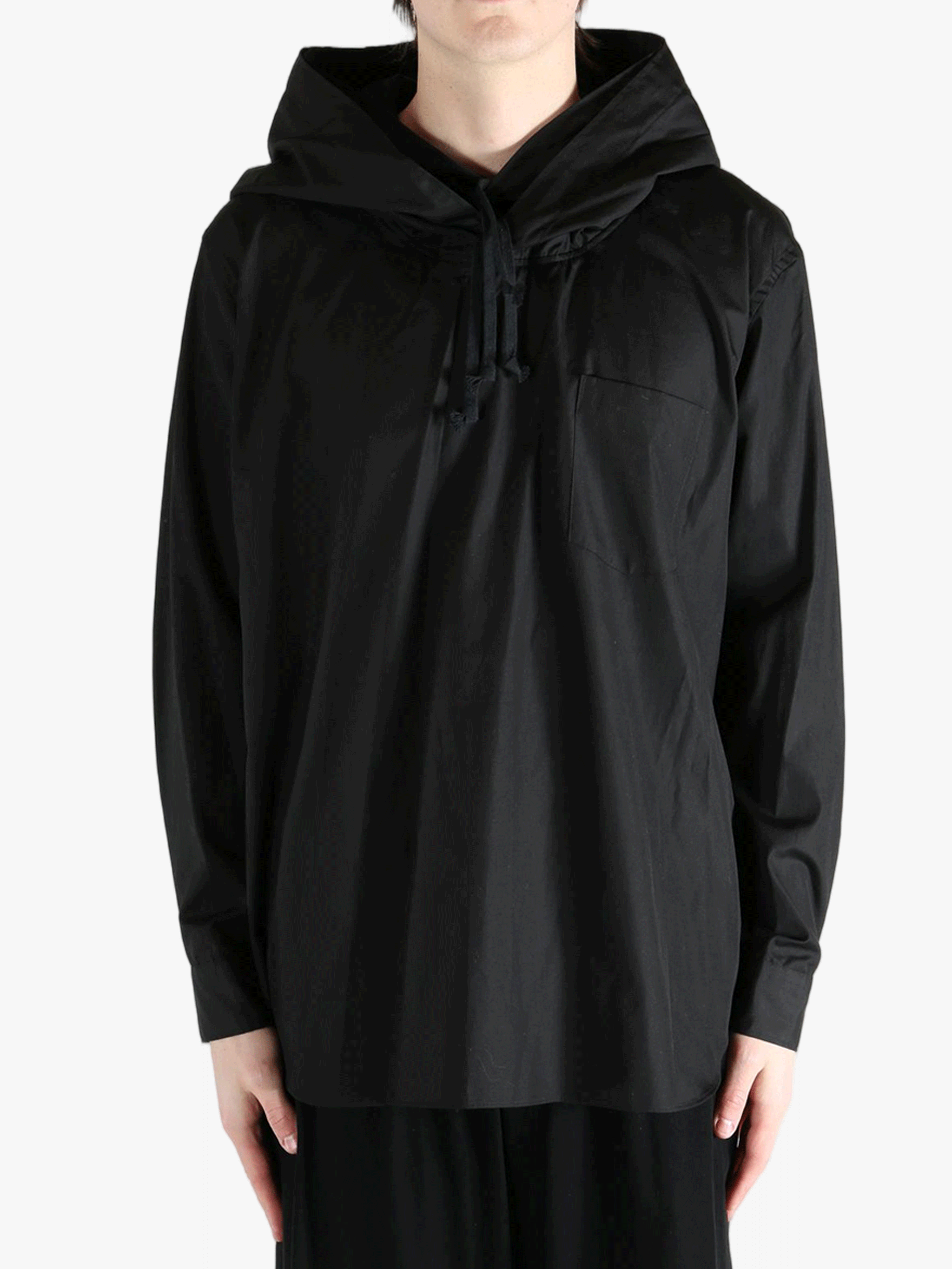 Black hoodie worn by a person, showing the hoodie's fit