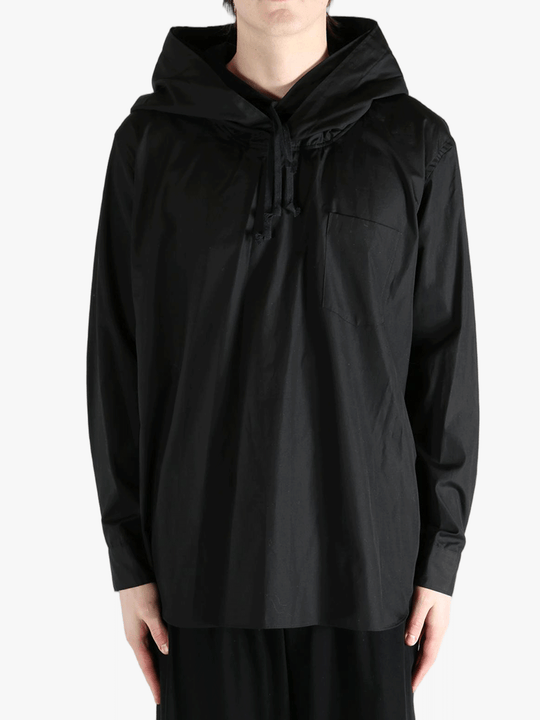 Black hoodie worn by a person, showing the hoodie's fit