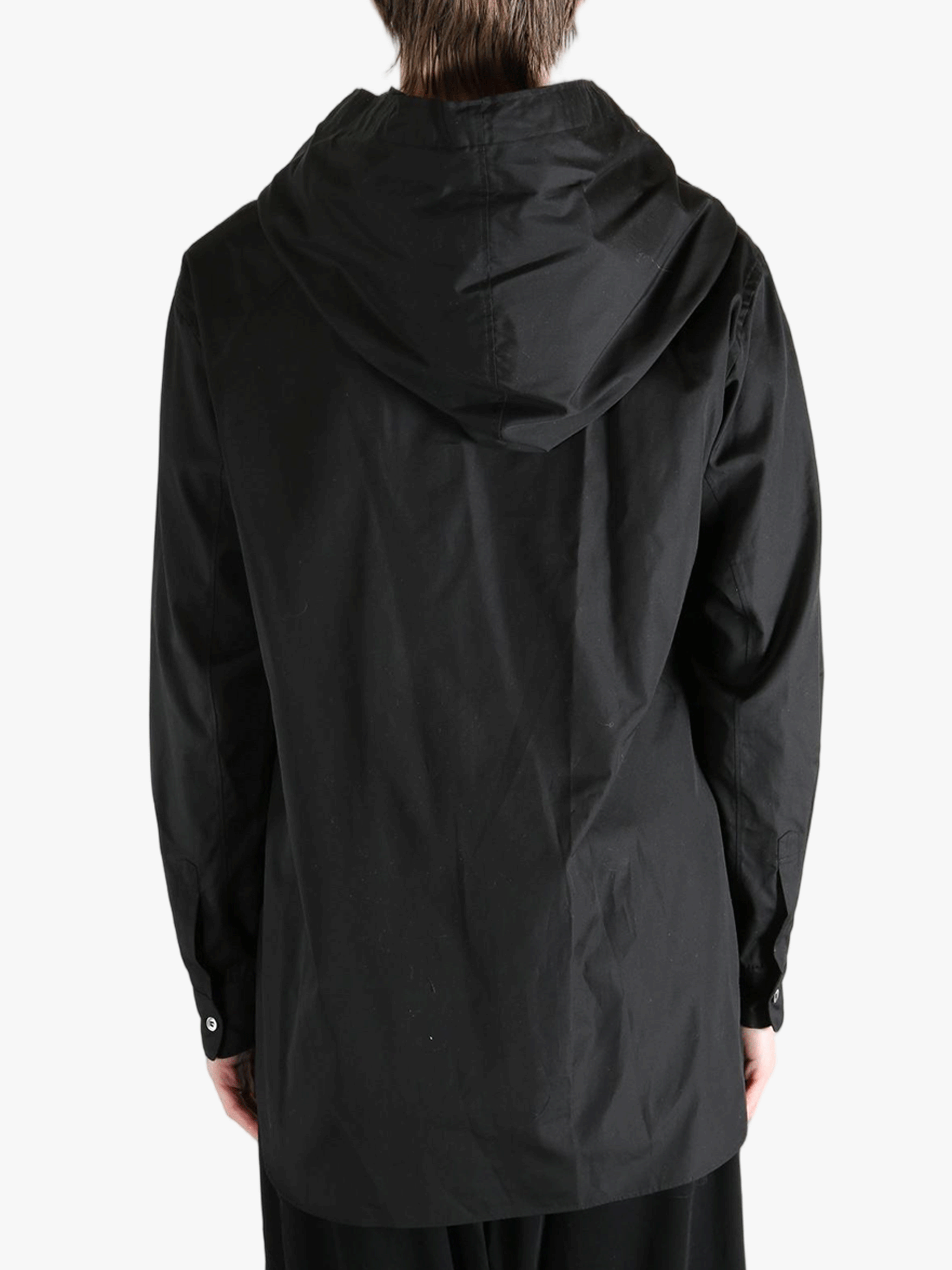 Black hoodie worn by a person, showing the hoodie's fit