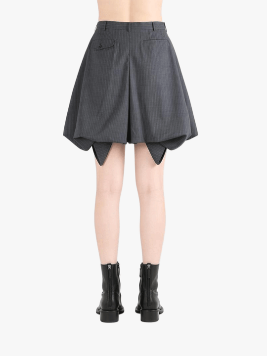 Grey shorts worn by a person, showing the shorts fit