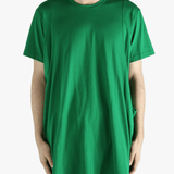 Green t-shirt worn by a person, showing the shirt's fit