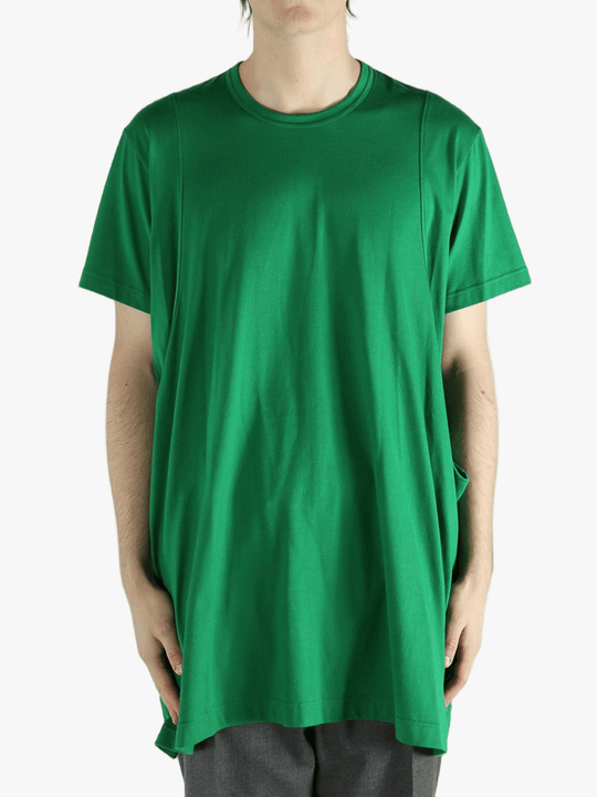 Green t-shirt worn by a person, showing the shirt's fit