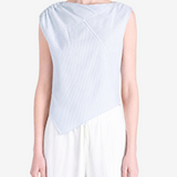 Blue top worn by a person, showing the top fit
