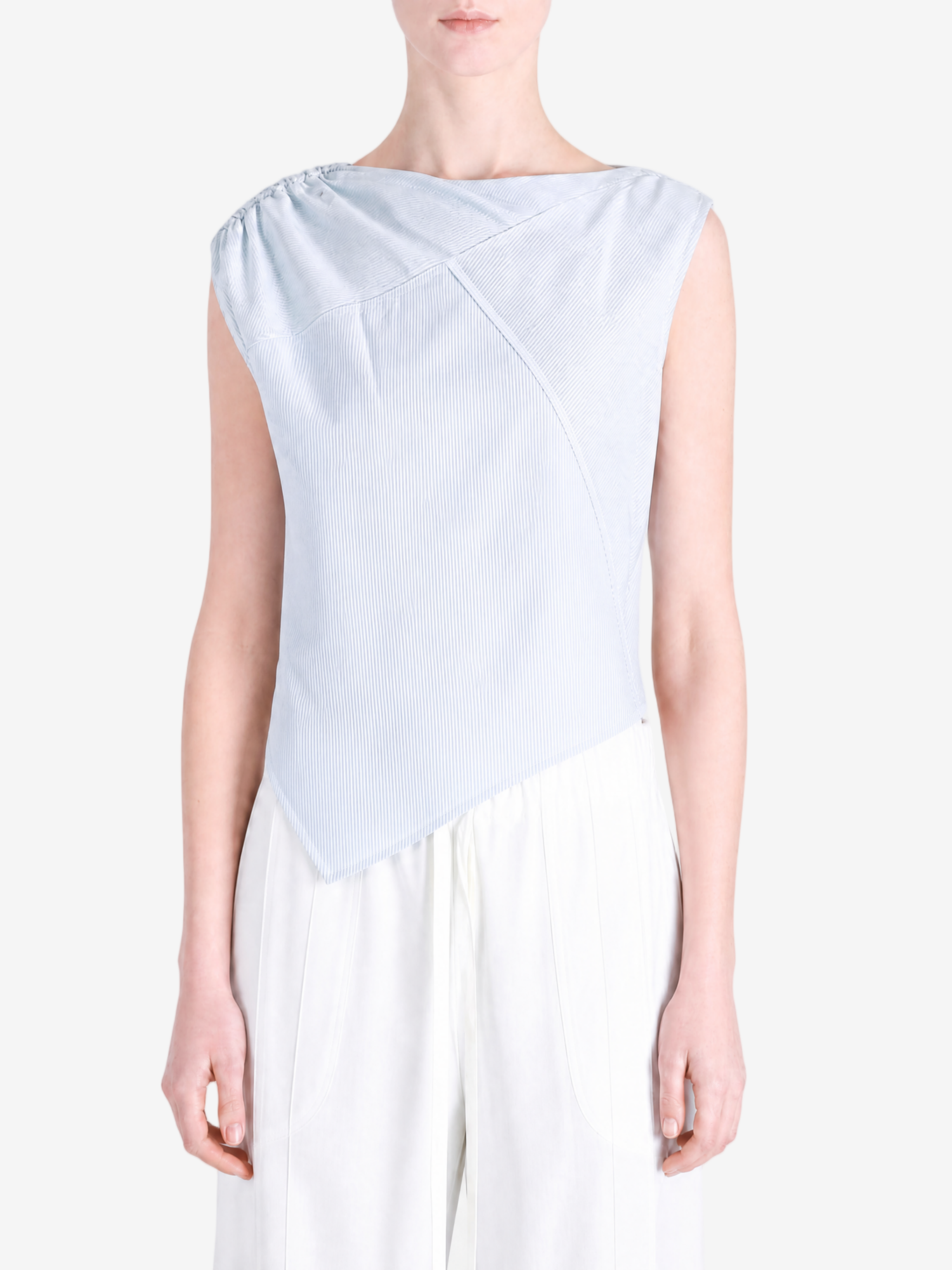 Blue top worn by a person, showing the top fit