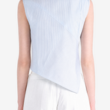 Blue top worn by a person, showing the top fit