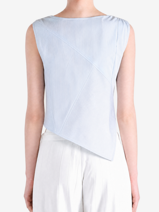 Blue top worn by a person, showing the top fit