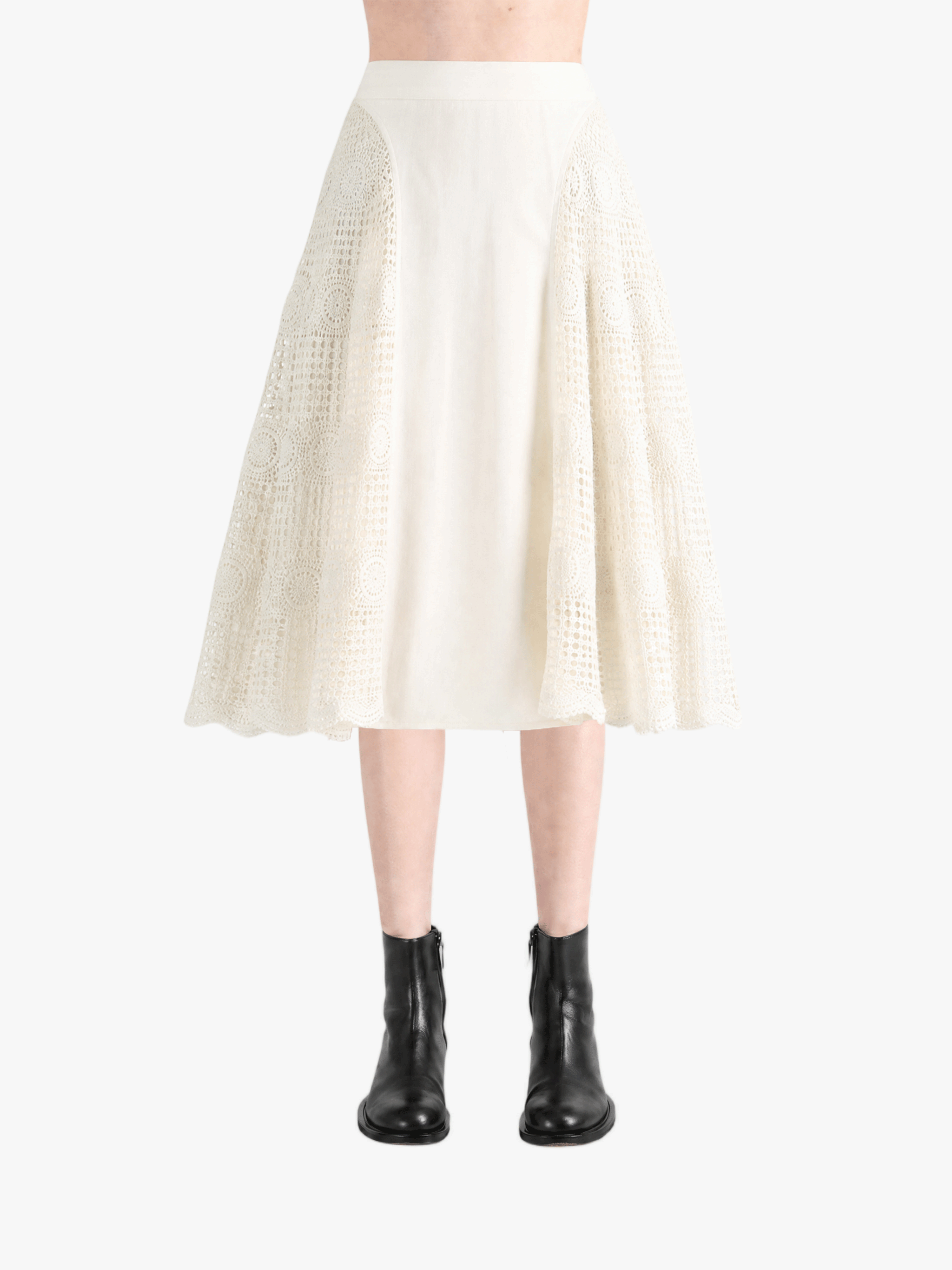 Tan skirt worn by a person, showing the skirt fit