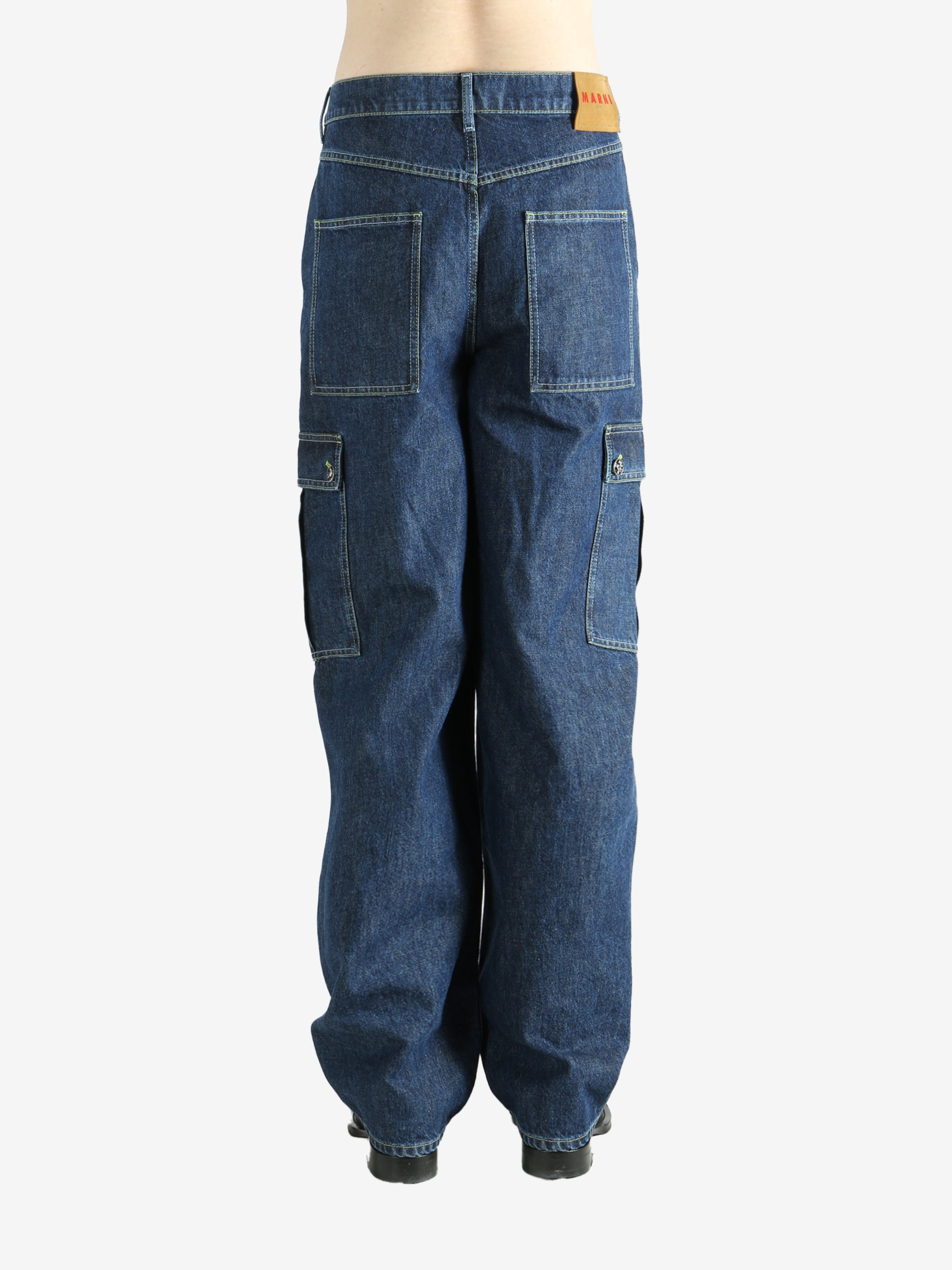 Blue pants worn by a person, showing the pants fit