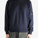 Blue sweatshirt worn by a person, showing the sweats' fit