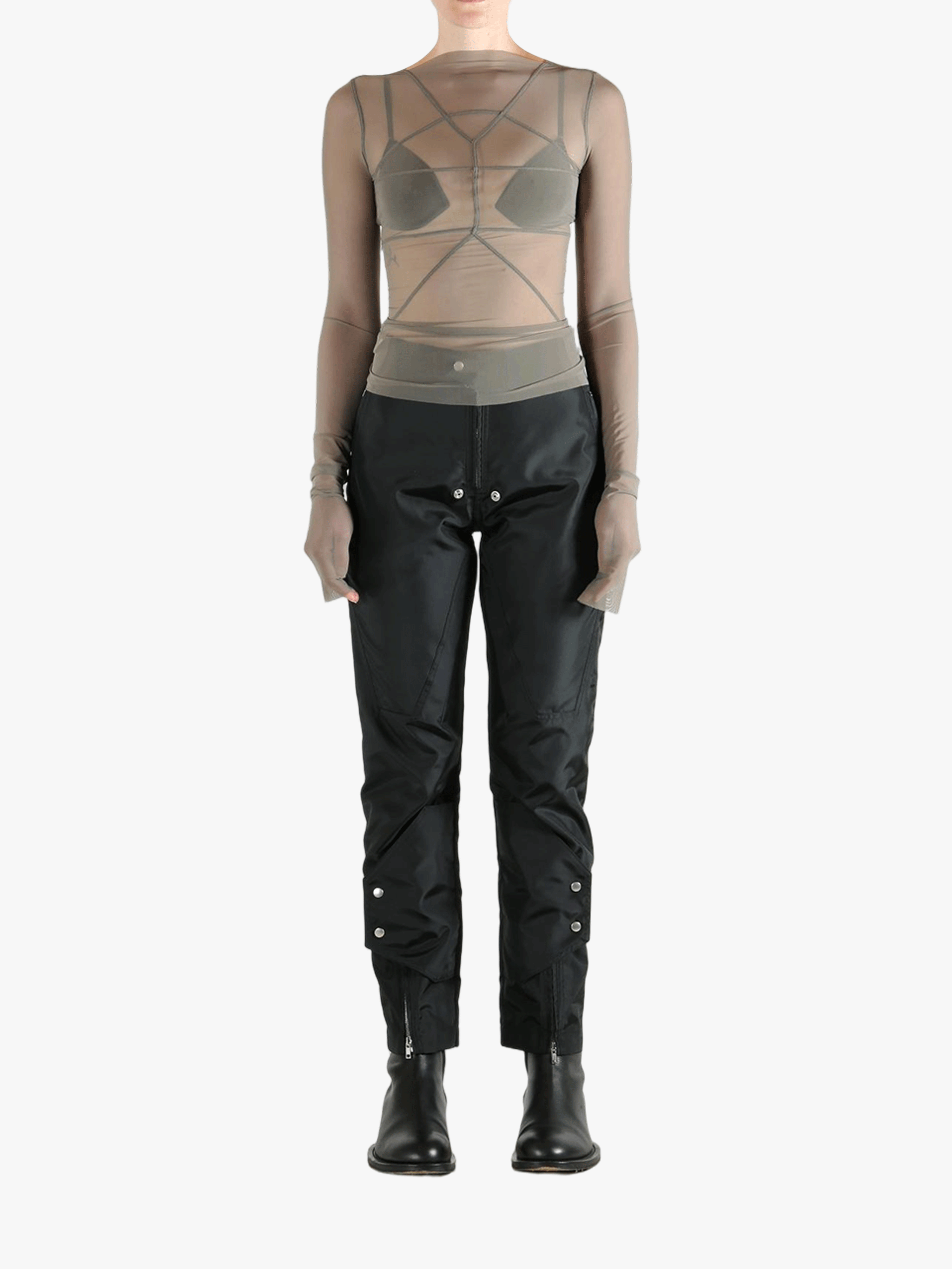 Grey tops worn by a person, showing the tight fit