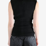 Black top worn by a person, showing the top's fit