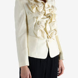 White jacket worn by a person, showing the jacket's fit