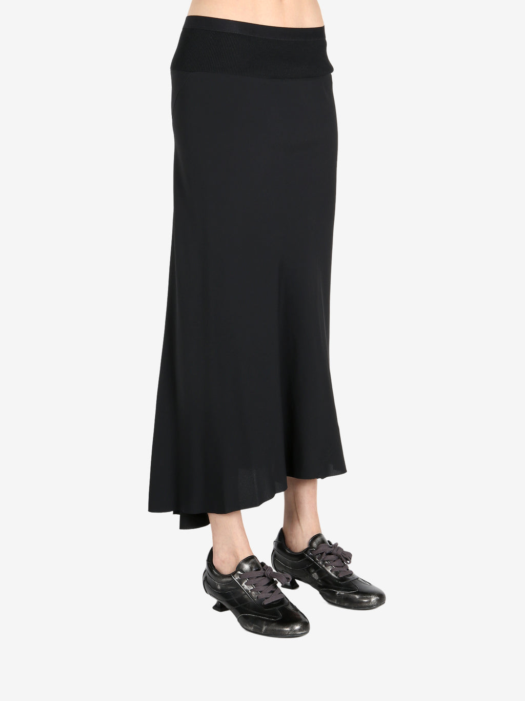Black skirt worn by a person, showing the skirt's fit